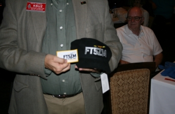 Dave K5UZ receives a patch and cap from FT5ZM DXpedition from K4UEE Bob